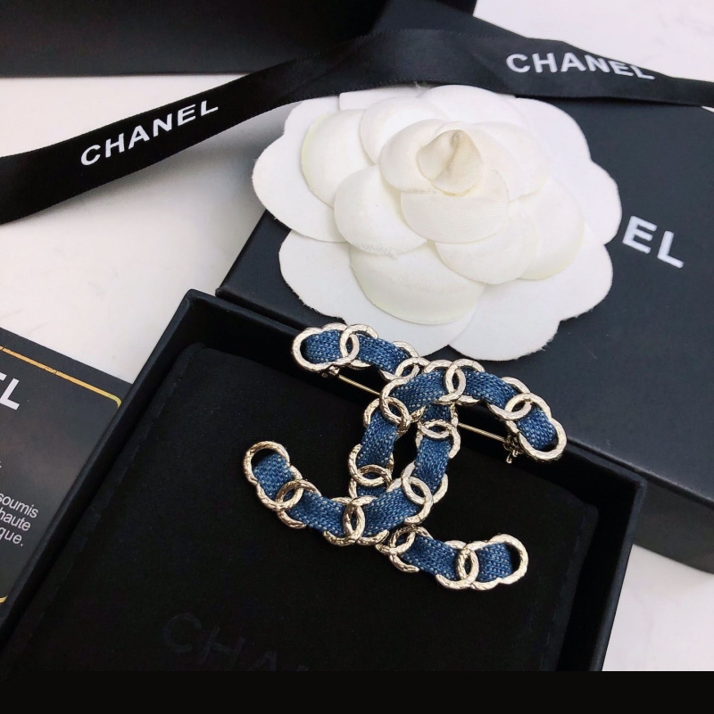 Ch*el brooches